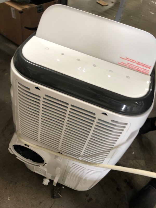 Photo 1 of BLACK+DECKER 10,000 BTU Portable Air Conditioner with Remote Control, White
