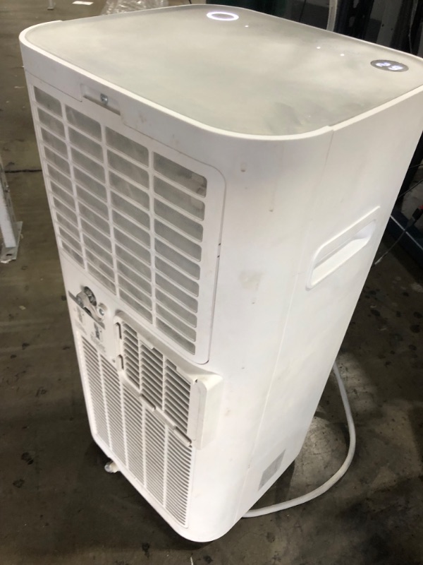 Photo 1 of COLZER 10,000 BTU Portable Air Conditioner for 400 Sq Ft 3-in-1 Portable AC Unit with Remote Control for Large Room-DOES NOT GET COLD 
