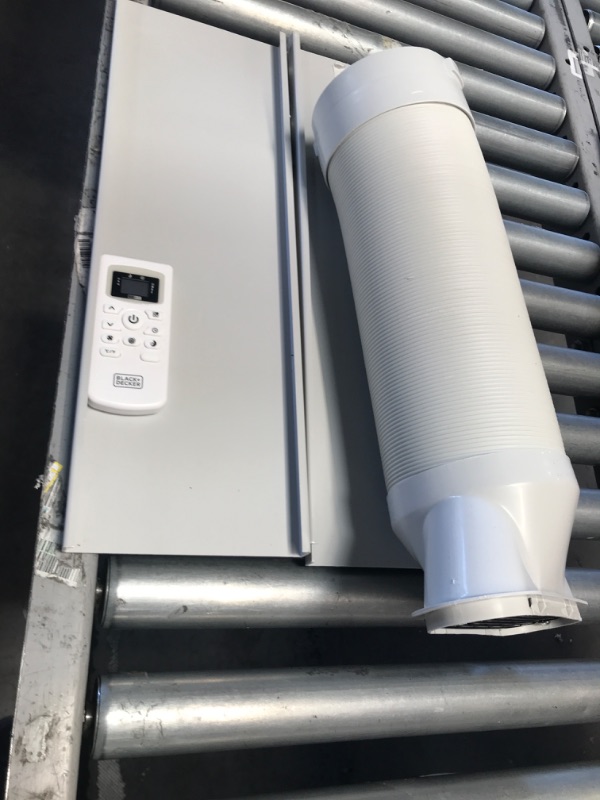 Photo 4 of **BLOWS COLD**- Black & Decker 8,000 BTU/4,000 BTU (DOE) Portable Air Conditioner with Remote Control, White
