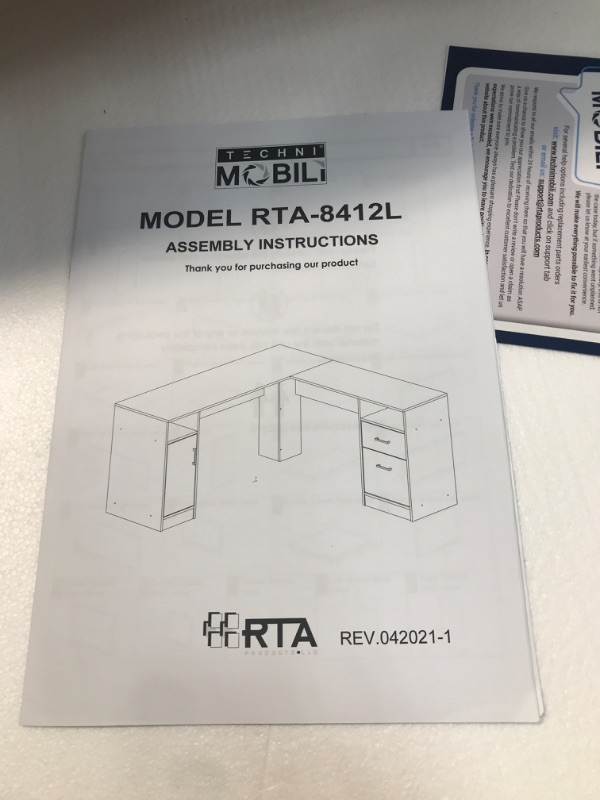 Photo 2 of **INCOMPLETE BOX 1 OF 2- Techni Mobili Functional L-Shape Desk with Storage, Grey
