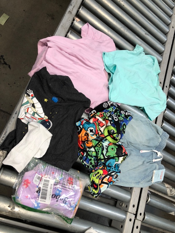 Photo 1 of assorted boy/girl clothes and different sizes