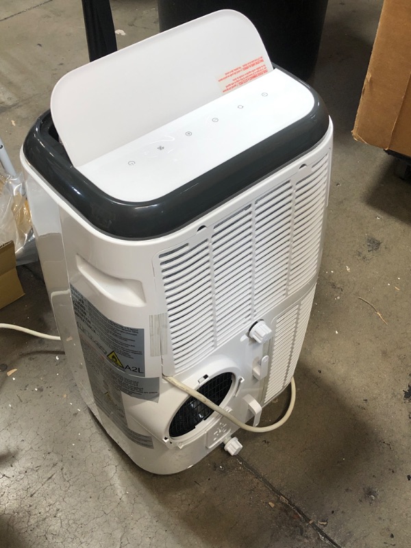 Photo 5 of USED: Black+decker 8,000 BTU Portable Air Conditioner with Remote Control, White 17.32"D x 27.2"W x 13.2"H
