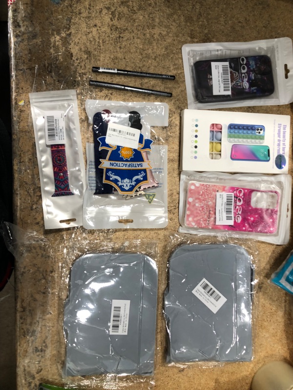 Photo 1 of  Personal Item Bundle.  2 Phone Cases, 2 Kitchen Sink Splash Guard and Watch Bands. 7 Items.