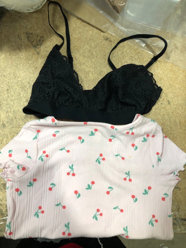 Photo 1 of Black Bra Size S and Pink Top XS.