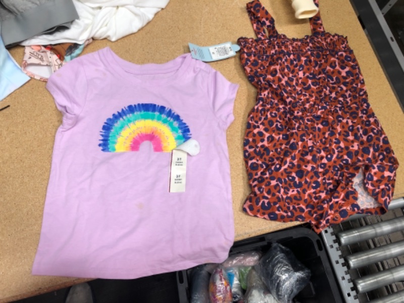 Photo 2 of 2 ITEMS) Toddler Girls' Animal Print Smocked Romper - Cat & Jack™ Brown SIZE 2T + Toddler Girls' Tie-Dye Rainbow Short Sleeve T-Shirt - Cat & Jack™ SIZE 3T (RAINBOW SHIRT HAS SOME SMALL STAINS)