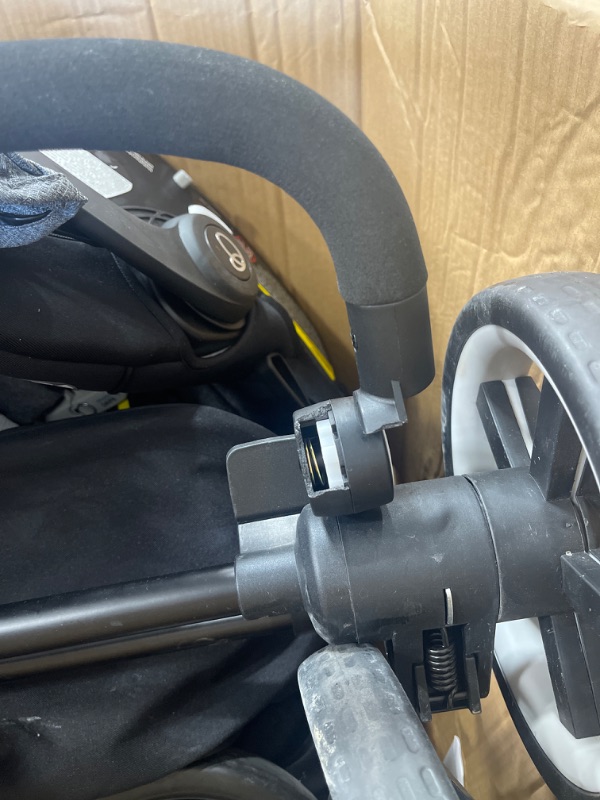 Photo 11 of Evenflo Gold Pivot Xpand Travel System Securemax Moonstone, 53112311. USED. ONE OF BACK WHEELS IS DESTROYED AS WELL AS A BREAK IN THE HANDLE. WHEEL POTENTIALLY REPAIRABLE