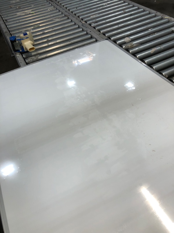 Photo 1 of **SUPER SMASHED-DENTED**
Amazon Basics Magnetic Dry Erase White Board, 35 x 47-Inch Whiteboard - Silver Aluminum Frame
