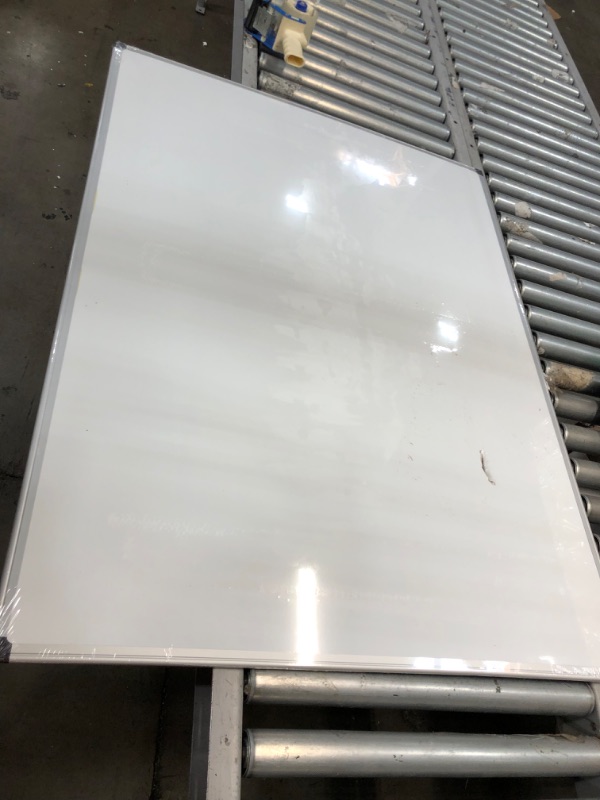 Photo 5 of **SUPER SMASHED-DENTED**
Amazon Basics Magnetic Dry Erase White Board, 35 x 47-Inch Whiteboard - Silver Aluminum Frame
