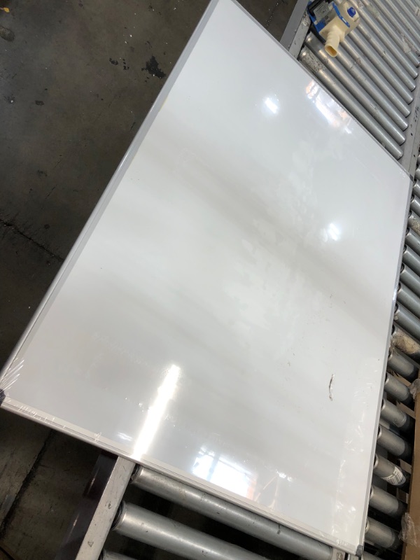 Photo 6 of **SUPER SMASHED-DENTED**
Amazon Basics Magnetic Dry Erase White Board, 35 x 47-Inch Whiteboard - Silver Aluminum Frame
