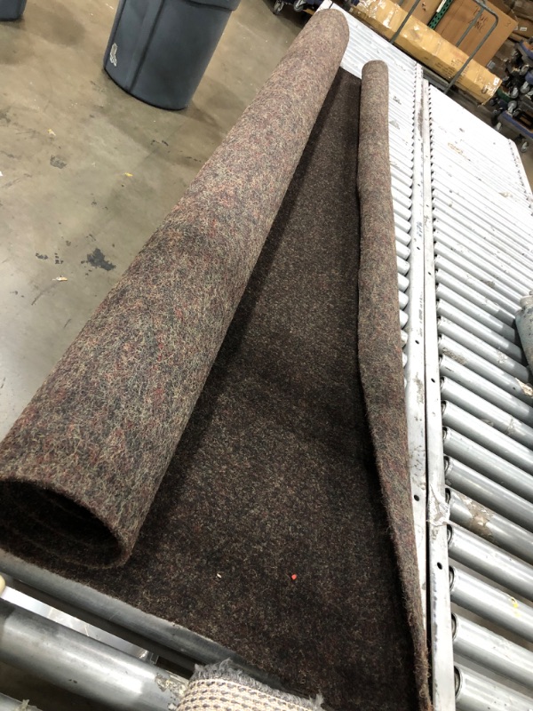 Photo 3 of **used-needs cleaning**
7ft x 10 ft  brown rug