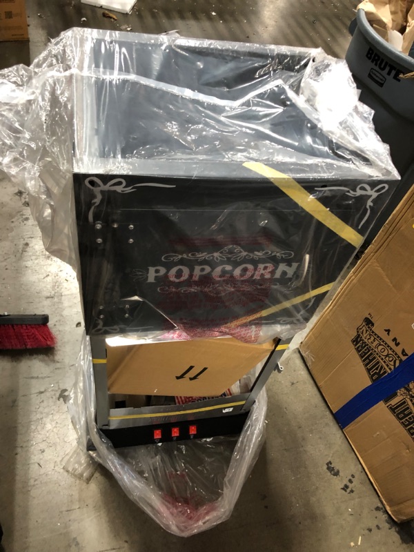 Photo 7 of **OPENED TO VERIFY PARTS**
Great Northern Popcorn 83-DT5630 6096 Black Foundation 8oz Full Popcorn Popper Machine with Cart - 8 oz
