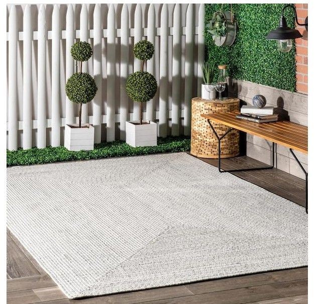 Photo 1 of **USED - NEEDS CLEANING**
Lefebvre Casual Braided Ivory 5 ft. x 8 ft. Indoor/Outdoor Area Rug
