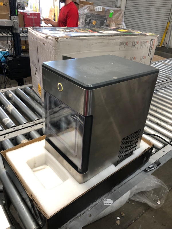 Photo 4 of **OPENED TO VERIFY PARTS**
GE Profile Opal | Countertop Nugget Ice Maker with Side Tank | Portable Ice Machine Makes up to 24 lbs. of Ice Per Day | Stainless Steel Finish
