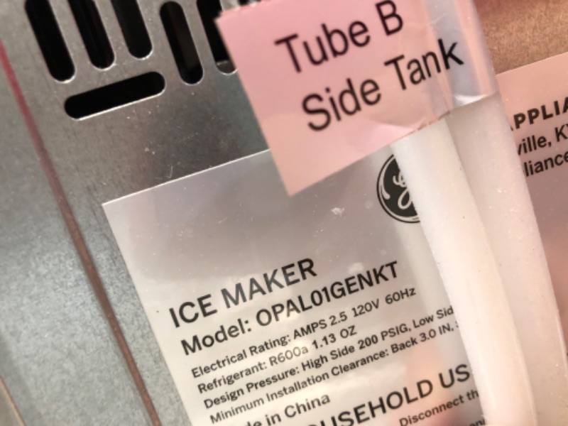 Photo 7 of **OPENED TO VERIFY PARTS**
GE Profile Opal | Countertop Nugget Ice Maker with Side Tank | Portable Ice Machine Makes up to 24 lbs. of Ice Per Day | Stainless Steel Finish
