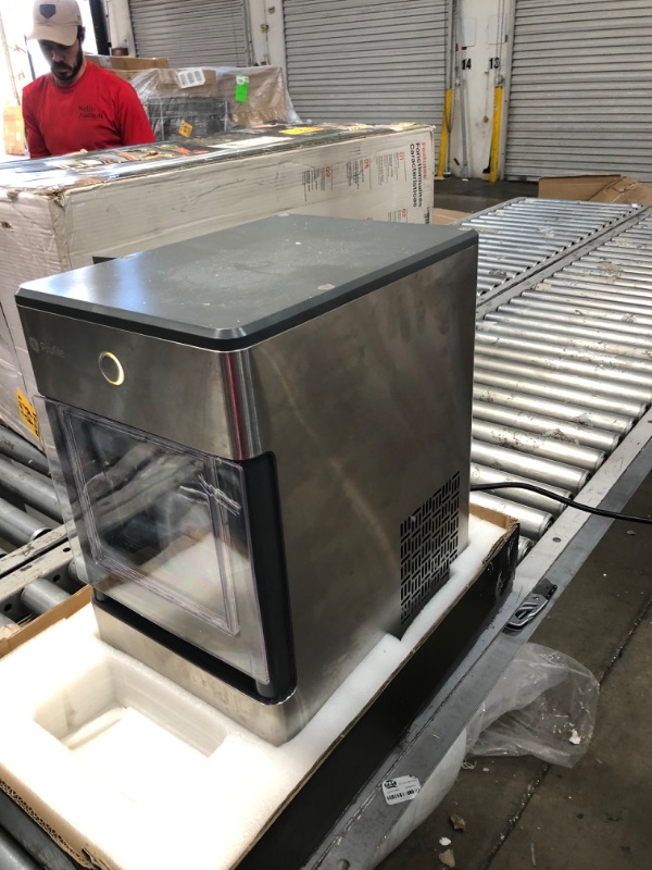 Photo 6 of **OPENED TO VERIFY PARTS**
GE Profile Opal | Countertop Nugget Ice Maker with Side Tank | Portable Ice Machine Makes up to 24 lbs. of Ice Per Day | Stainless Steel Finish
