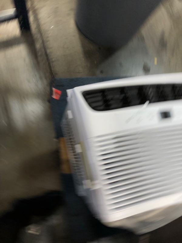 Photo 4 of **MINOR DENTED**
Frigidaire FHWW123WBE Smart Window Air Conditioner with Wi-Fi Control, White
