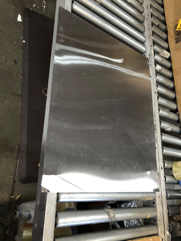 Photo 1 of **DENTED**
24 X 30 SHEET METAL PIECE