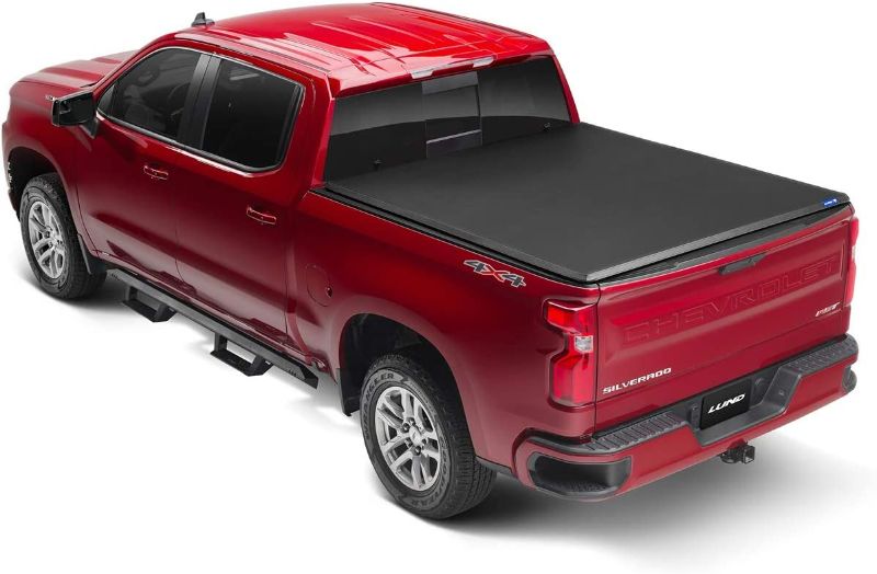 Photo 1 of **used**
Lund Genesis Tri-Fold Soft Folding Truck Bed Tonneau Cover | 950292 | Fits 2019 - 2023 Chevy/GMC Silverado/Sierra, works w/ MultiPro/Flex tailgate 5' 10" Bed (69.9")
