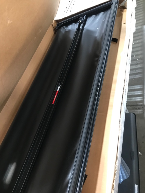 Photo 2 of **used**
Lund Genesis Tri-Fold Soft Folding Truck Bed Tonneau Cover | 950292 | Fits 2019 - 2023 Chevy/GMC Silverado/Sierra, works w/ MultiPro/Flex tailgate 5' 10" Bed (69.9")
