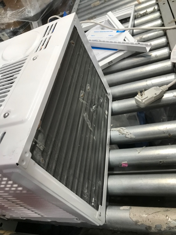 Photo 7 of **OPENED TO VERIFY PARTS**
MIDEA MAW05M1BWT Window Air Conditioner 5000 BTU with Mechanical Controls 7 Temperature Settings 2 Cooling and Fan Settings 110V White
