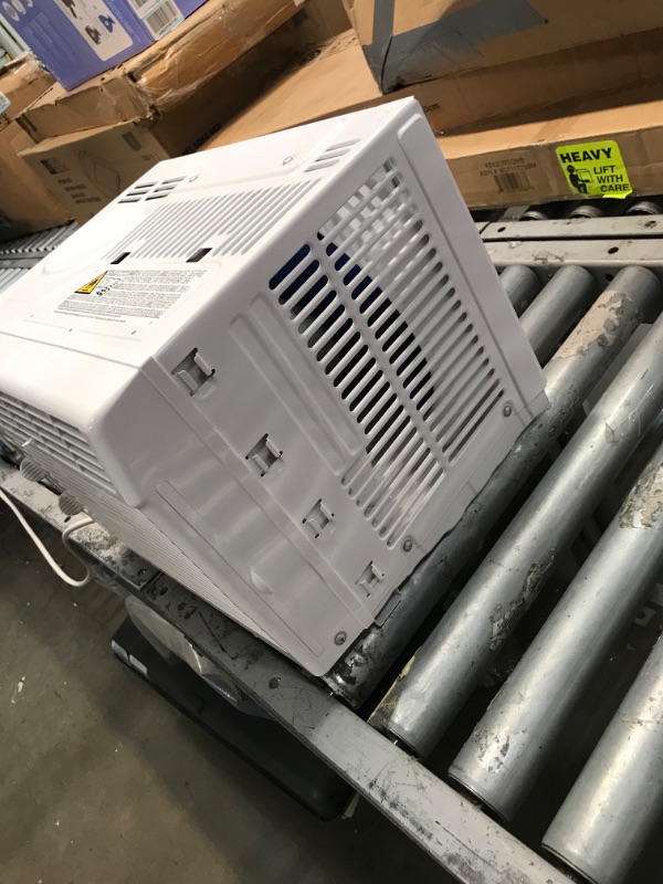 Photo 6 of **OPENED TO VERIFY PARTS**
MIDEA MAW05M1BWT Window Air Conditioner 5000 BTU with Mechanical Controls 7 Temperature Settings 2 Cooling and Fan Settings 110V White

