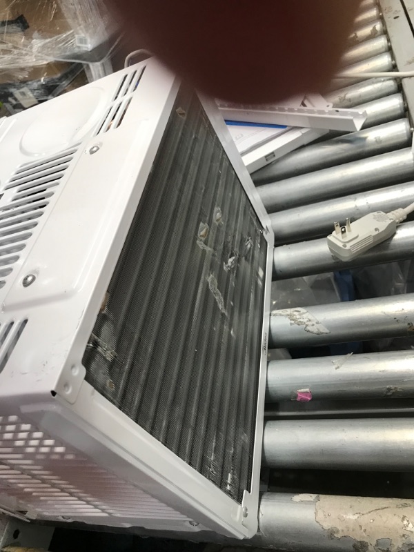 Photo 8 of **OPENED TO VERIFY PARTS**
MIDEA MAW05M1BWT Window Air Conditioner 5000 BTU with Mechanical Controls 7 Temperature Settings 2 Cooling and Fan Settings 110V White
