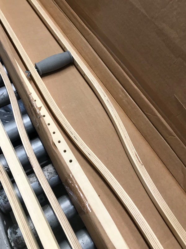 Photo 1 of **MUST ASSEMBLE**
SET OF 2 50' INCH WOODEN CRUTCHES 