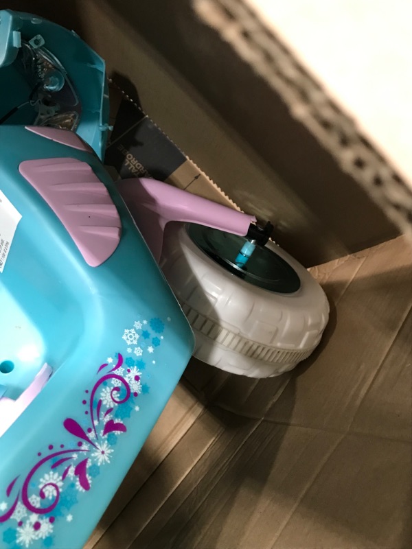 Photo 7 of **used-minor damage****
Kid Trax Disney Frozen Kids Scooter Ride On Toy, 6 Volt, Kids 3-5 Years Old, Max Weight 55 lbs, Single Rider, Battery and Charger Included, Blue
