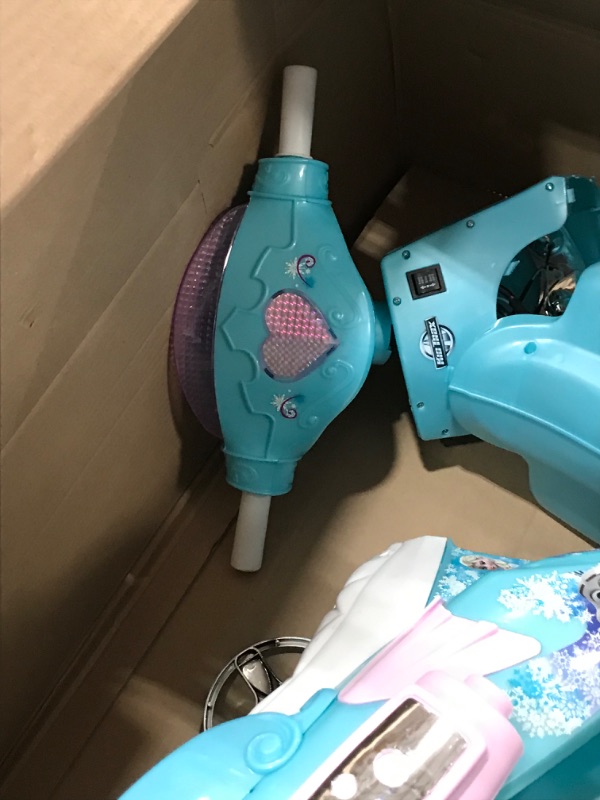 Photo 5 of **used-minor damage****
Kid Trax Disney Frozen Kids Scooter Ride On Toy, 6 Volt, Kids 3-5 Years Old, Max Weight 55 lbs, Single Rider, Battery and Charger Included, Blue
