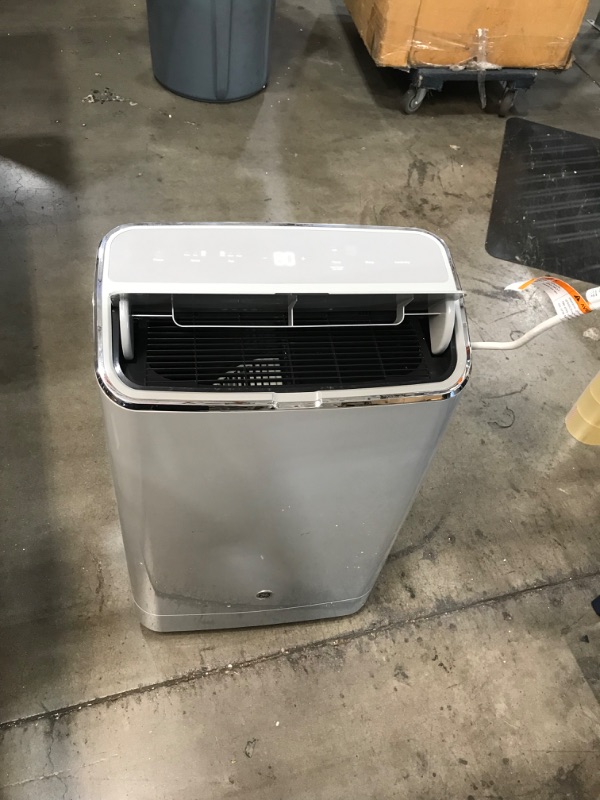 Photo 2 of **MINOR DAMAGE** 
GE Appliances 10,000 BTU 115-Volt 3-in-1 Portable Air Conditioner with Wi-Fi for Medium Rooms, Gray, APWD10JAWG
