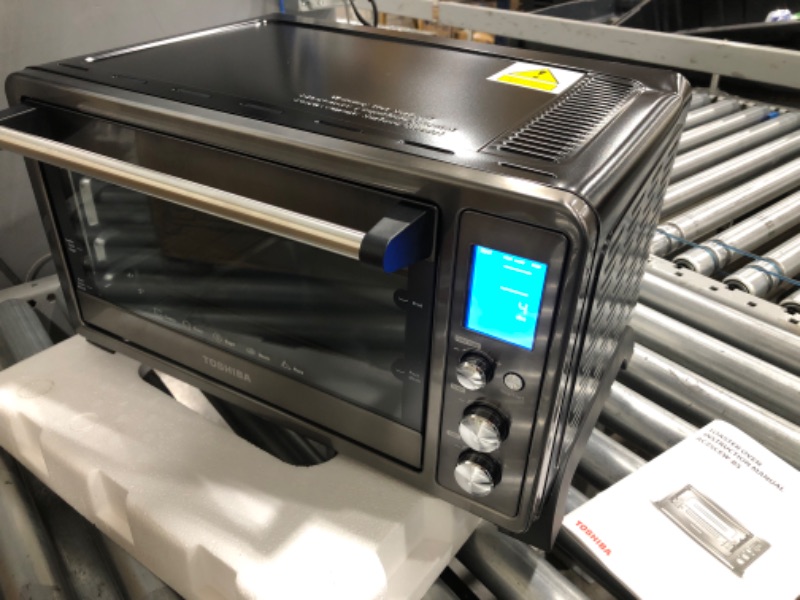 Photo 2 of **MINOR DENT** toshiba ac25cew-bs digital oven with convection/toast/bake/broil function, 6-slice bread/12-inch pizza, black stainless steel