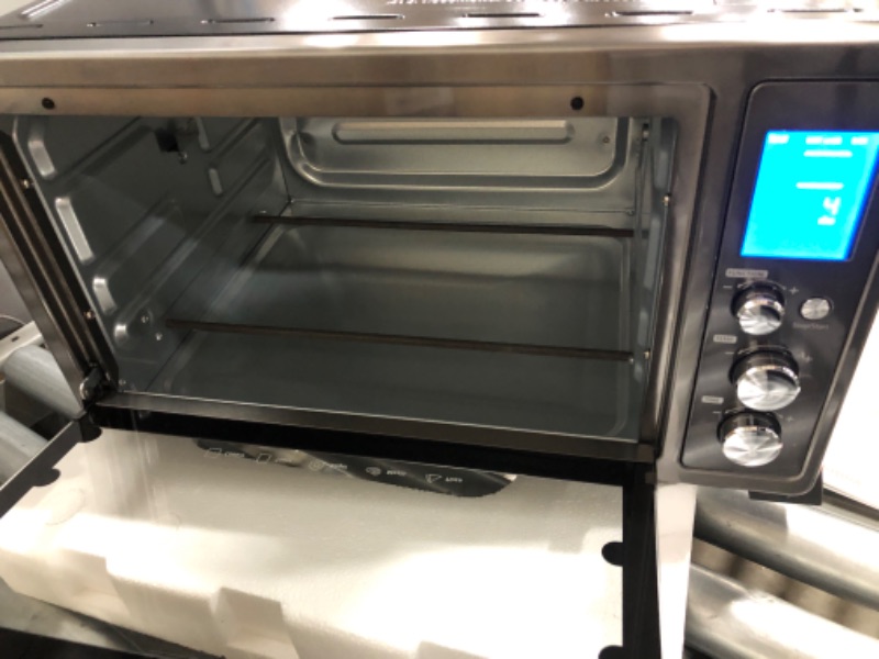 Photo 1 of **MINOR DENT** toshiba ac25cew-bs digital oven with convection/toast/bake/broil function, 6-slice bread/12-inch pizza, black stainless steel