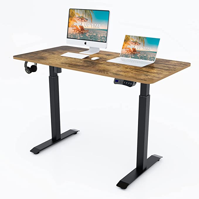 Photo 1 of Electric Standing Desk- Adjustable Height Desk, Sit Stand Desk Frame & 55 x 24 Inches Table Top, Adjustable Desks for Home Office, Walnut Style
