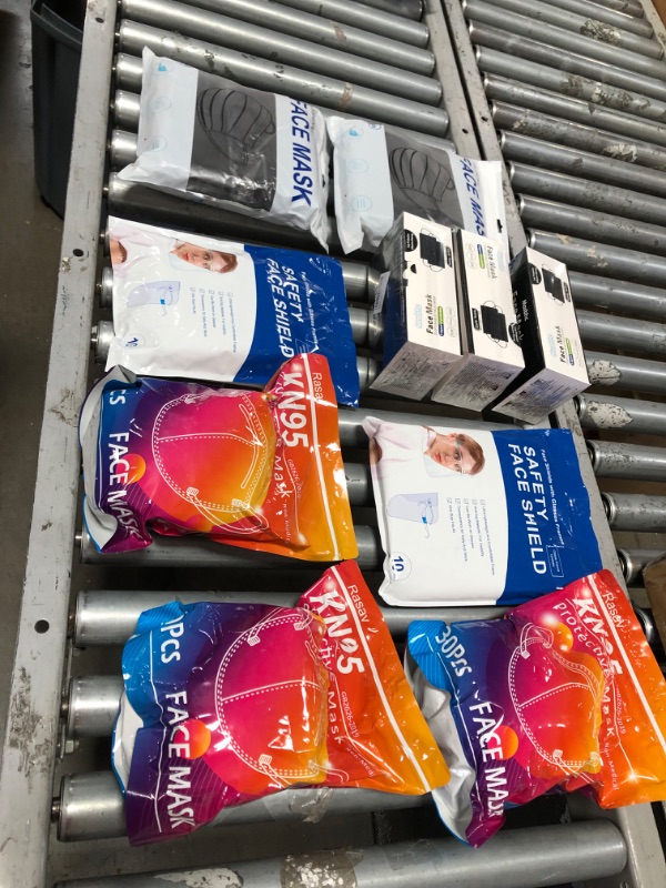 Photo 1 of 10 pcks of different types of face masks variety may change