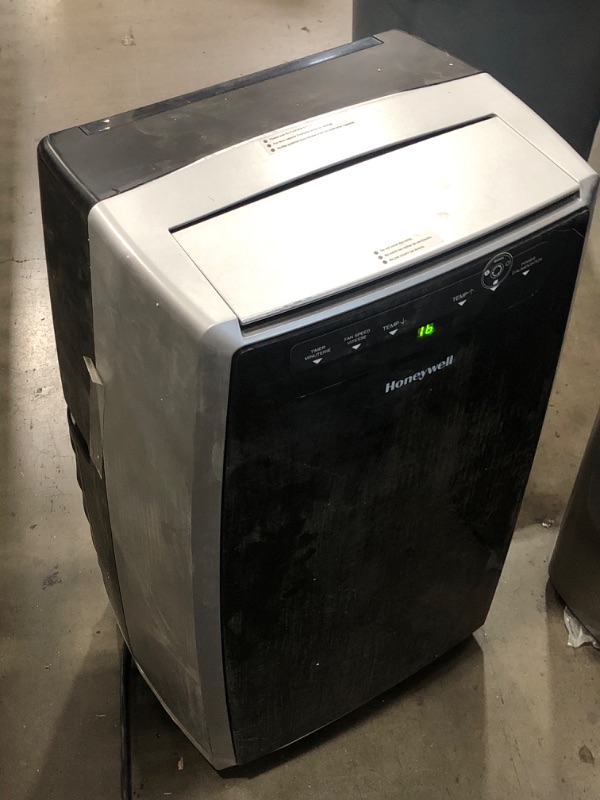 Photo 2 of USED: Honeywell Portable Air Conditioner w Heat Pump, Dehumidifier & Fan, Cools & Heats Rooms Up to 700 Sq. Ft. w Remote & Advanced LED Display, MN4HFS9 15.2"D x 18.1"W x 29.4"H

