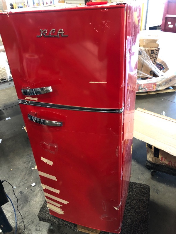 Photo 8 of **SOME TAPE ON UNIT* DAMAGED* RCA RFR786-RED 2 Door Apartment Size Refrigerator with Freezer, 7.5 cu. ft, Retro Red
