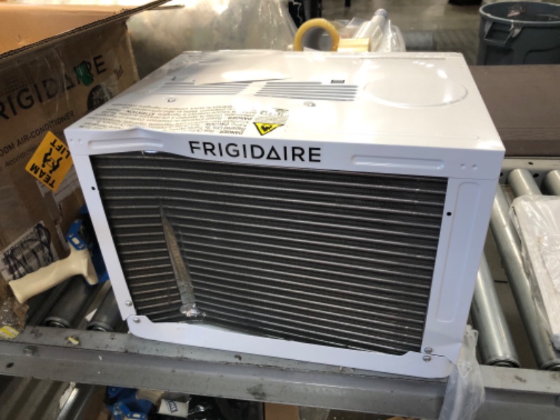 Photo 7 of (DENTED) Frigidaire FFRE083WAE Window-Mounted Room Air Conditioner, 8,000 BTU with Multi-Speed Fan, Programmable Timer, Sleep Mode, Easy-to-Clean Washable Filter, in White
