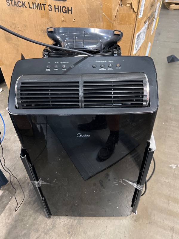 Photo 2 of Midea Duo 12,000 BTU (10,000 BTU SACC) HE Inverter Ultra Quiet Portable Air Conditioner, Cools up to 450 Sq. Ft., Works with Alexa/Google Assistant, Includes Remote Control & Window Kit
