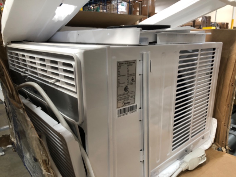 Photo 1 of Midea 12,000 BTU EasyCool Window Air Conditioner, Dehumidifier and Fan - Cool, Circulate and Dehumidify up to 550 Sq. Ft., Reusable Filter, Remote Control
