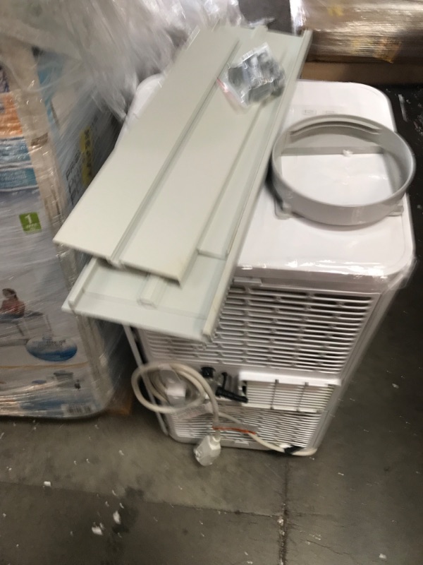 Photo 2 of GE 6,100 BTU Portable Air Conditioner for Small Rooms up to 250 sq ft., 3-in-1 with Dehumidify, Fan and Auto Evaporation, Included Window Installation Kit
