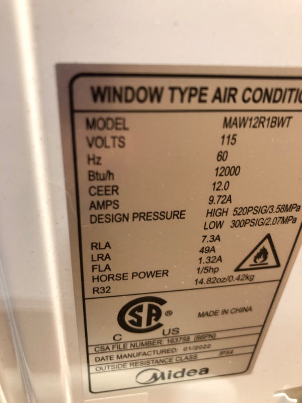 Photo 2 of Midea MAW12R1BWT 12,000 BTU 115V Window AC W/Remote.
