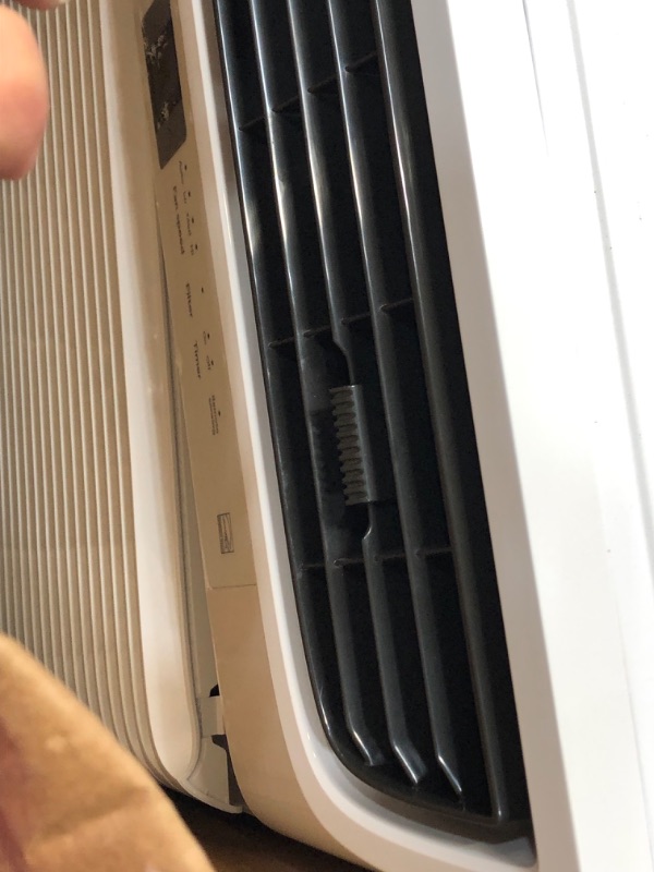 Photo 4 of -USED-DENTED-
Frigidaire FFRE103WAE Window-Mounted Room Air Conditioner, 10,000 BTU with Multi-Speed Fan, Energy Saving Mode, Sleep Mode, Programmable Timer, Easy-to-Clean Washable Filter, in White
