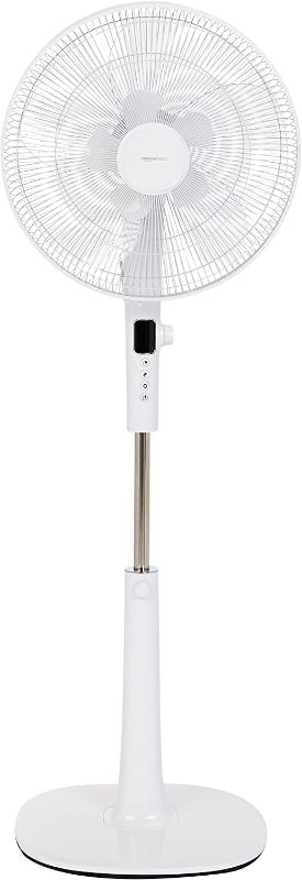 Photo 1 of Amazon Basics Oscillating Dual Blade Standing Pedestal Fan with Remote - Quiet DC Motor, 16-Inch
