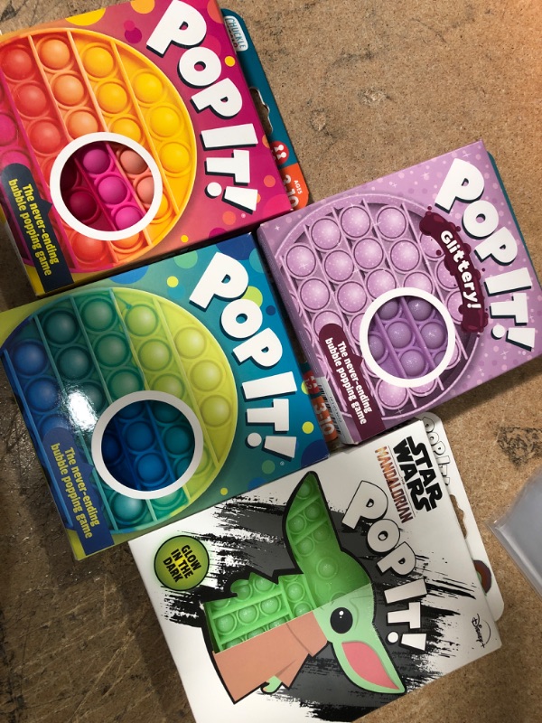 Photo 3 of BUNDLE OF ( 4 ITEMS) Buffalo Games Pop It! Star Wars: Grogu & Chuckle & Roar Pop It! Blue-Green Tie Dye Bubble Popping and Sensory Game
