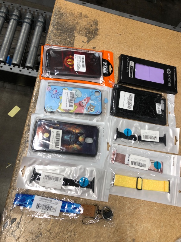 Photo 1 of 10 ITEMS 
ASSORTED PHONE CASES AND WATCH STRAPS 