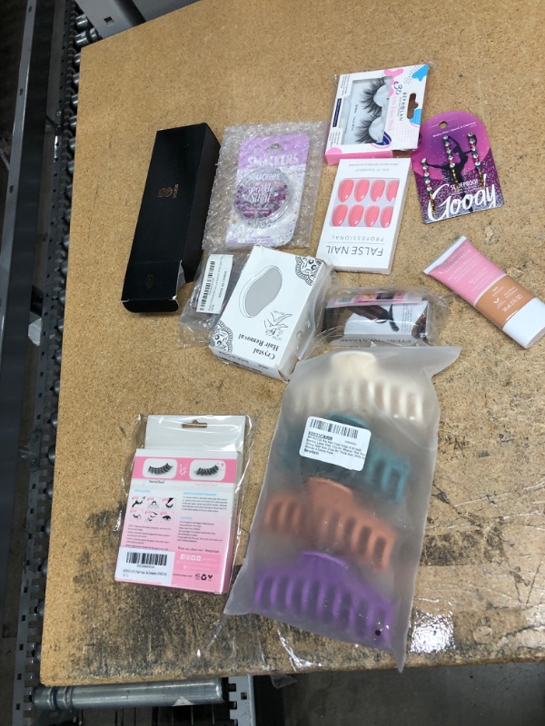 Photo 1 of 11 HEALTH AND BEAUTY ITEMS: GLASSES, LASHES, FOUNDATION, NAILS , AND HAIR CLIPS