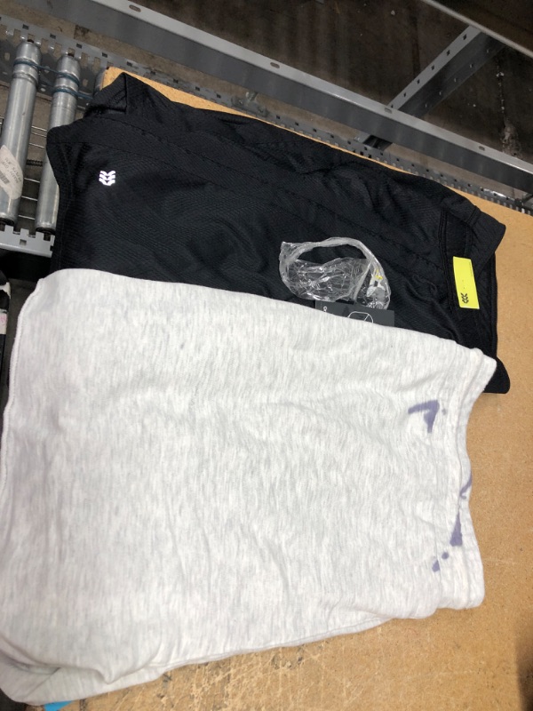 Photo 1 of 2 pair of x large shirts
grey and black