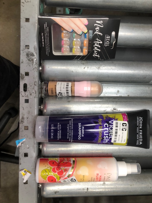 Photo 1 of  4 item bundle, miscellaneous 
MAKE UP,BODY MIST, SHAMPOO 
