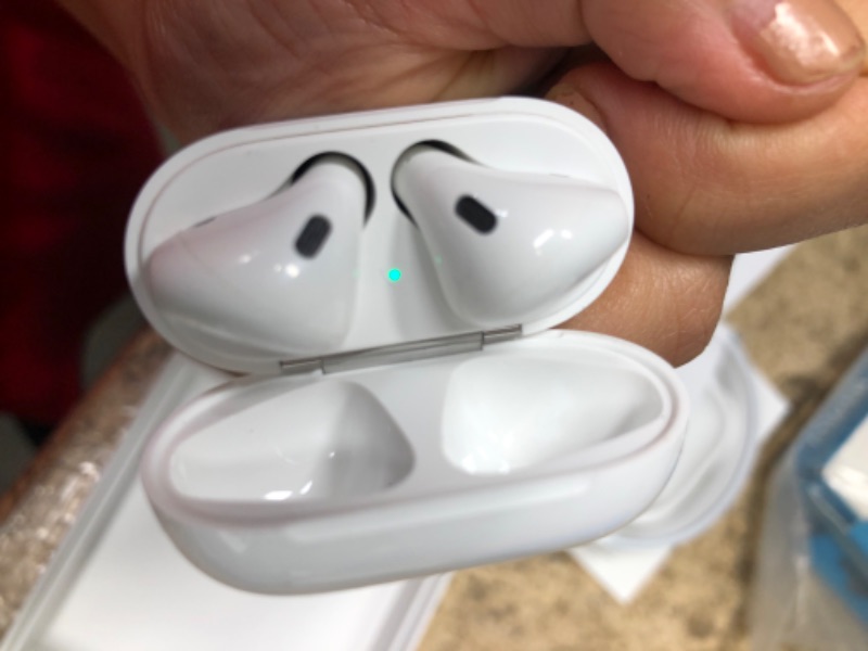 Photo 2 of Apple AirPods True Wireless Bluetooth Headphones (2nd Generation) with Charging Case

