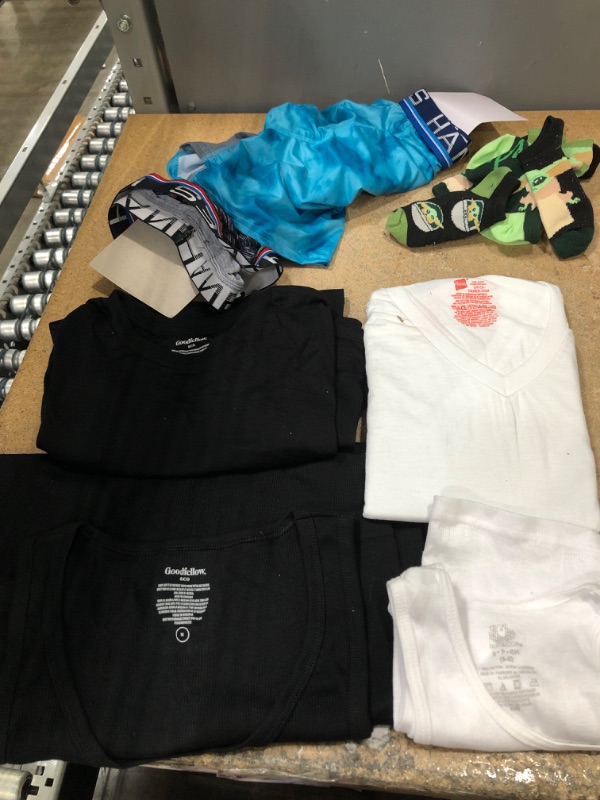 Photo 1 of ***5 items*** Men clothing Bundle ***black top size M, black t shirt size Med, 3 set of men boxer brief large L, white top size small, and socks
